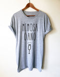 Mimosa Gang unisex t-shirt in heather grey, hanging on a wood hanger