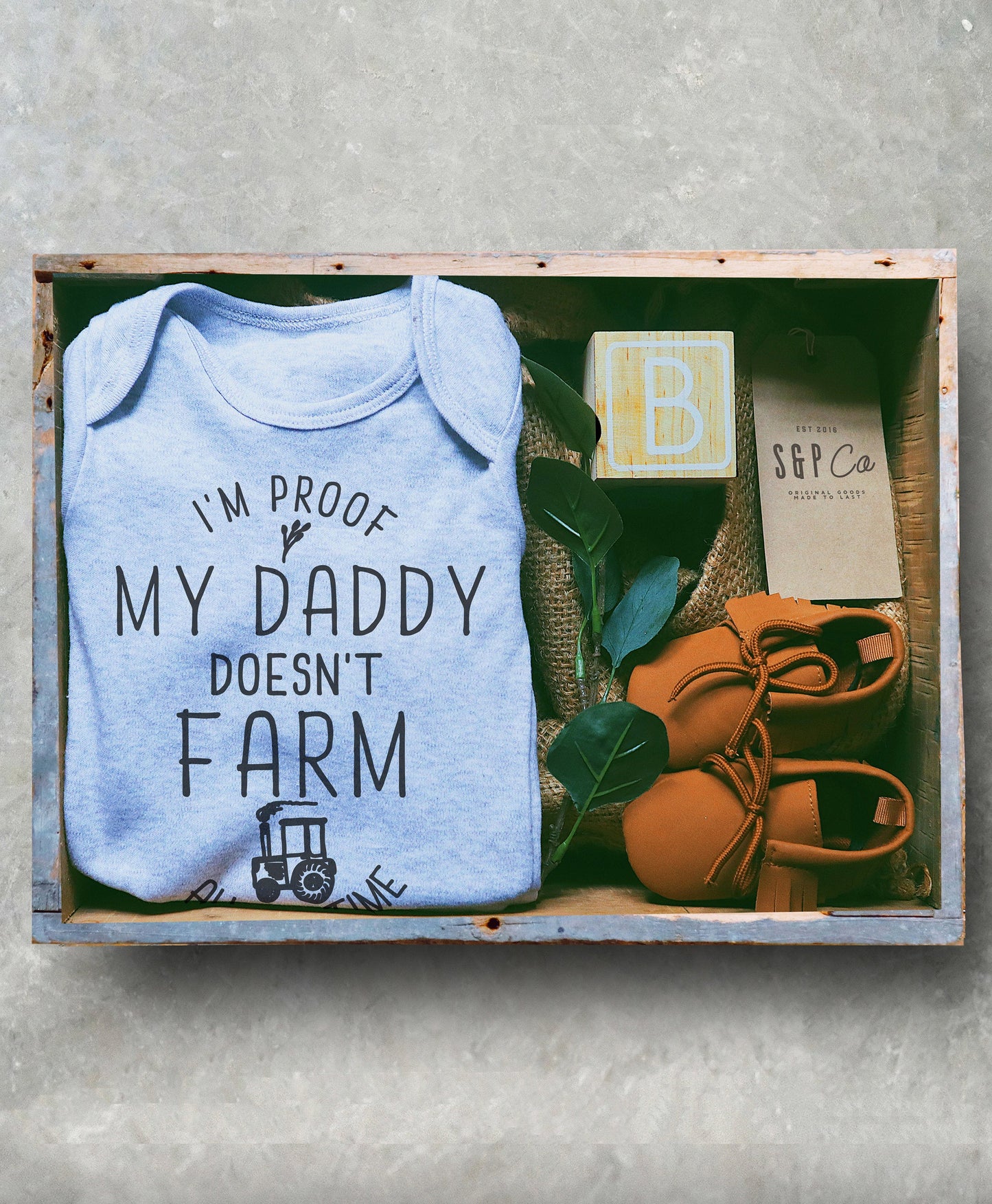 I'm Proof My Daddy Doesn't Farm All The Time Baby Bodysuit.